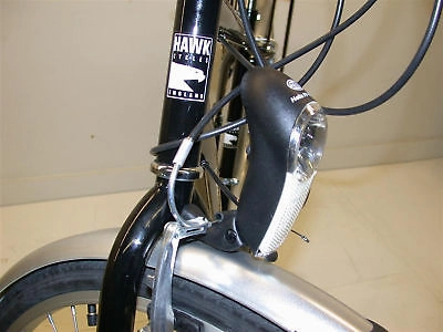 DYNAMO LIGHT HEADLAMP WITH BATTERY STAND BY. GREAT SAFETY FEATURE DUTCH BIKES