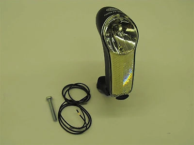 DYNAMO LIGHT HEADLAMP WITH BATTERY STAND BY. GREAT SAFETY FEATURE DUTCH BIKES